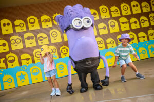 Let the games begin at Illumination’s Minions vs. Minions: Bello Bay Club where the Yellow Minions attempt to rein in their Purple counterparts leading to water-soaked fun.