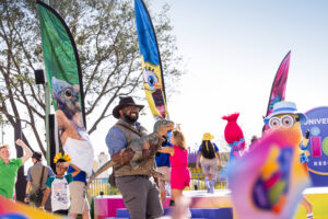 The grand opening day excitement continued with a playful processional as hundreds of kids, alongside their favorite characters, paraded to the Isle of Curiosity, where catchy choreographed dance moments came to life inspired by the park’s beloved brands  - Gabby’s Dollhouse, Shrek, Trolls and Puss in Boots from DreamWorks Animation, Illumination’s Minions, Nickelodeon’s SpongeBob SquarePants from Paramount Products and Experiences and Universal Pictures’ Jurassic World.