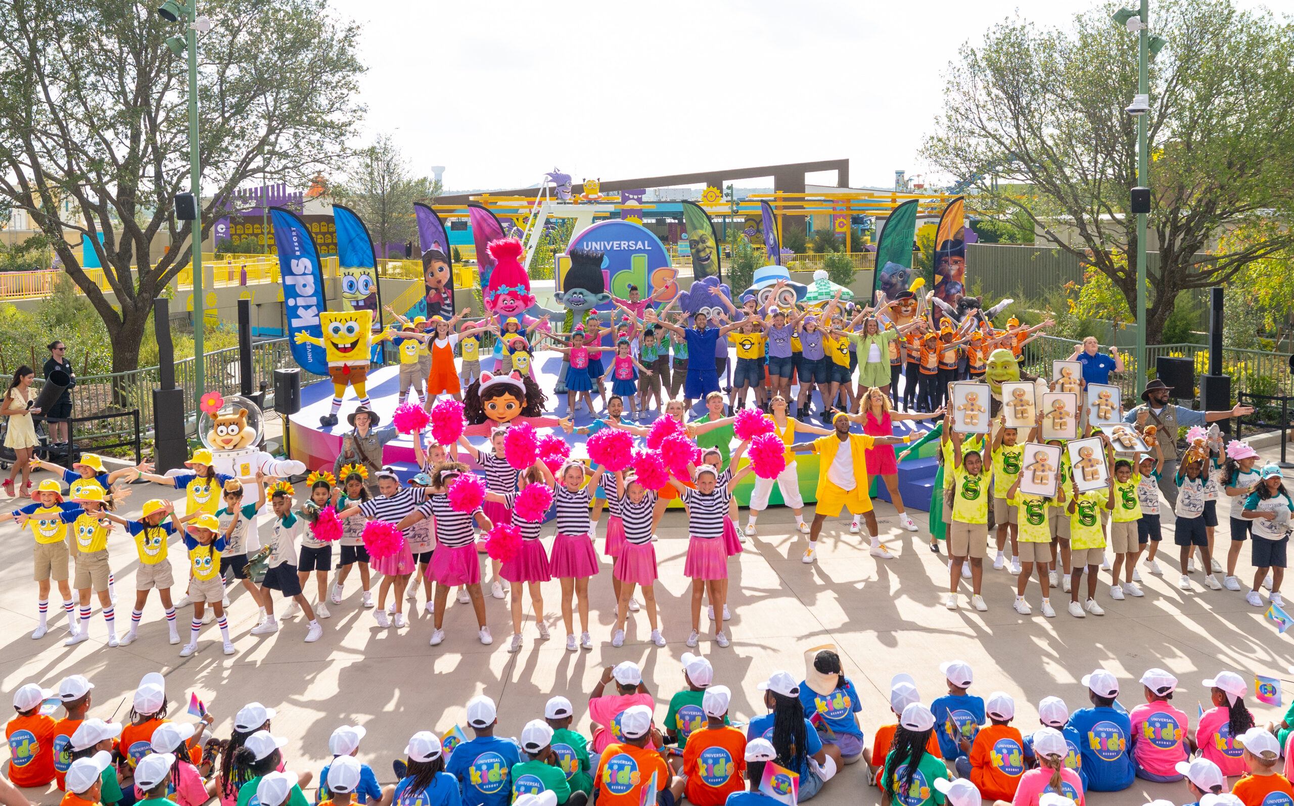 a playful processional of hundreds of kids, alongside their favorite characters, paraded to the Isle of Curiosity
